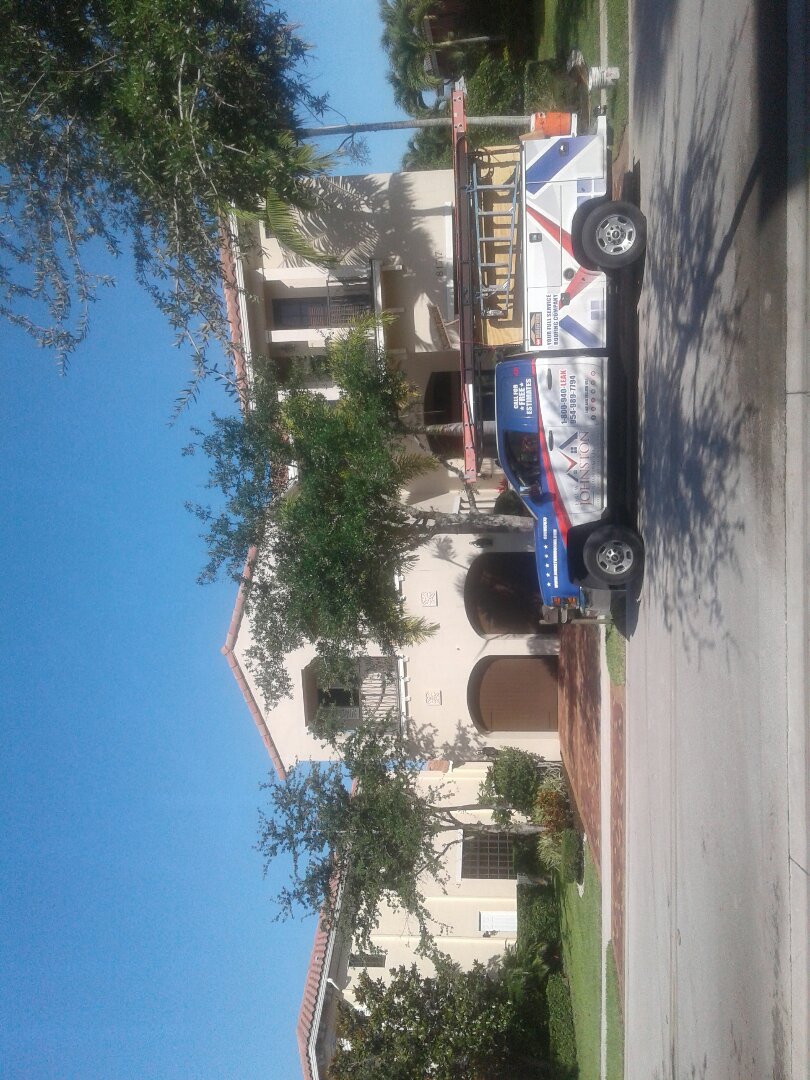 Tile roof repair in the city of Parkland Florida just repairs being done by Earl W Johnson roofing company Tony and Regis are you repair technicians Tile roof repair in the city of Parkland Florida just repairs being done by Earl W Johnson roofing company Tony and Regis are you repair technicians