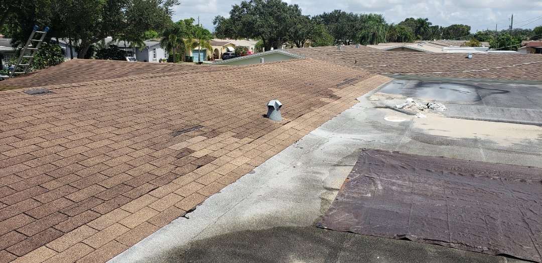 Shingle and flat roof repair estimate in Cooper City, FL by Mike Wilde of Earl Johnston Roofing Shingle and flat roof repair estimate in Cooper City, FL by Mike Wilde of Earl Johnston Roofing