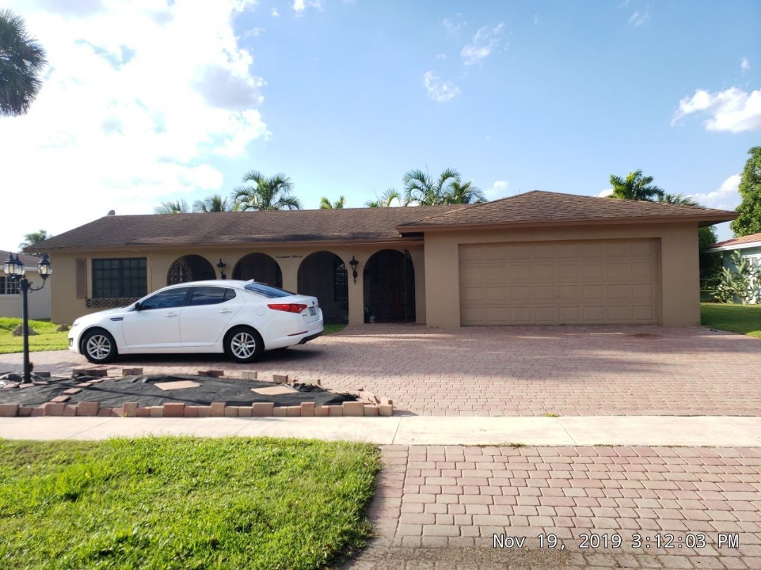 Gaf Timberline hd shingle and flat re-roof estimate in Plantation, FL by Mike Wilde of Earl Johnston Roofing Gaf Timberline hd shingle and flat re-roof estimate in Plantation, FL by Mike Wilde of Earl Johnston Roofing
