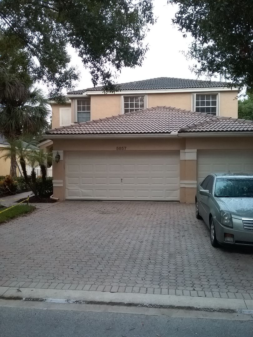 Coconut Creek, FL - Roof tile repair in the City of Coconut Creek Florida this repairs being done by Earl W Johnston roofing company Tony and Regis are your repair technicians Coconut Creek, FL - Roof tile repair in the City of Coconut Creek Florida this repairs being done by Earl W Johnston roofing company Tony and Regis are your repair technicians