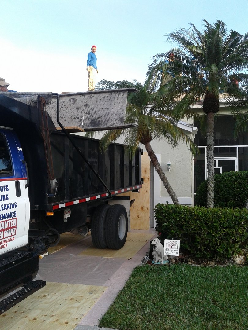 Tamarac, FL - Starting a 32sq tile reroof in Tamarac ,by Earl w Johnston roofing Tamarac, FL - Starting a 32sq tile reroof in Tamarac ,by Earl w Johnston roofing