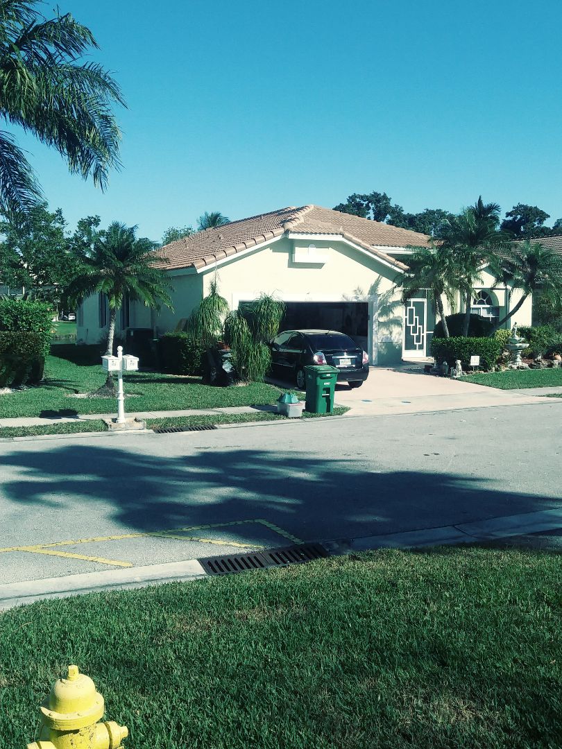 Tamarac, FL - Finished eagle Malibu concrete roof tile boca cream by earl w Johnston roofing llc Tamarac, FL - Finished eagle Malibu concrete roof tile boca cream by earl w Johnston roofing llc