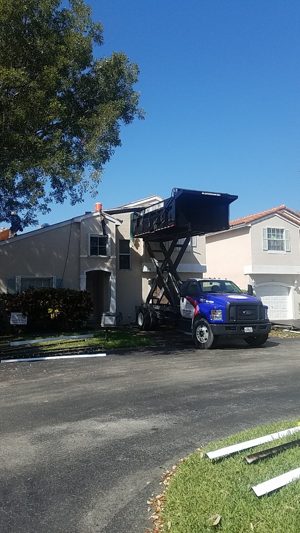Coconut Creek, FL - Tile roof replacement tearoff by Aj from Earl Johnston Roofing Company Coconut Creek, FL - Tile roof replacement tearoff by Aj from Earl Johnston Roofing Company