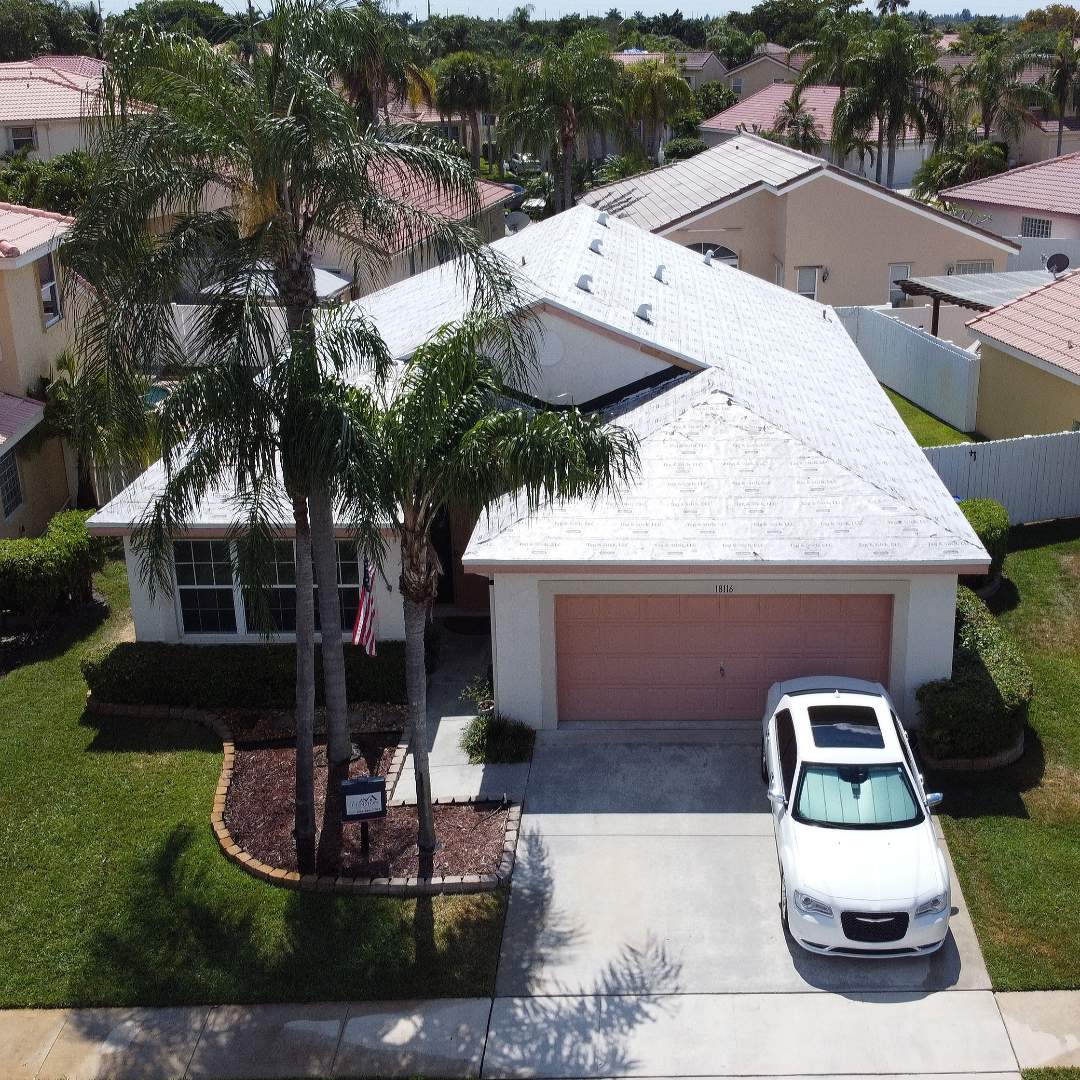 Tag N Stick Tile re-roof is starting today in Pembroke Pines Florida by Mike Wilde of Earl Johnston Roofing Tag N Stick Tile re-roof is starting today in Pembroke Pines Florida by Mike Wilde of Earl Johnston Roofing