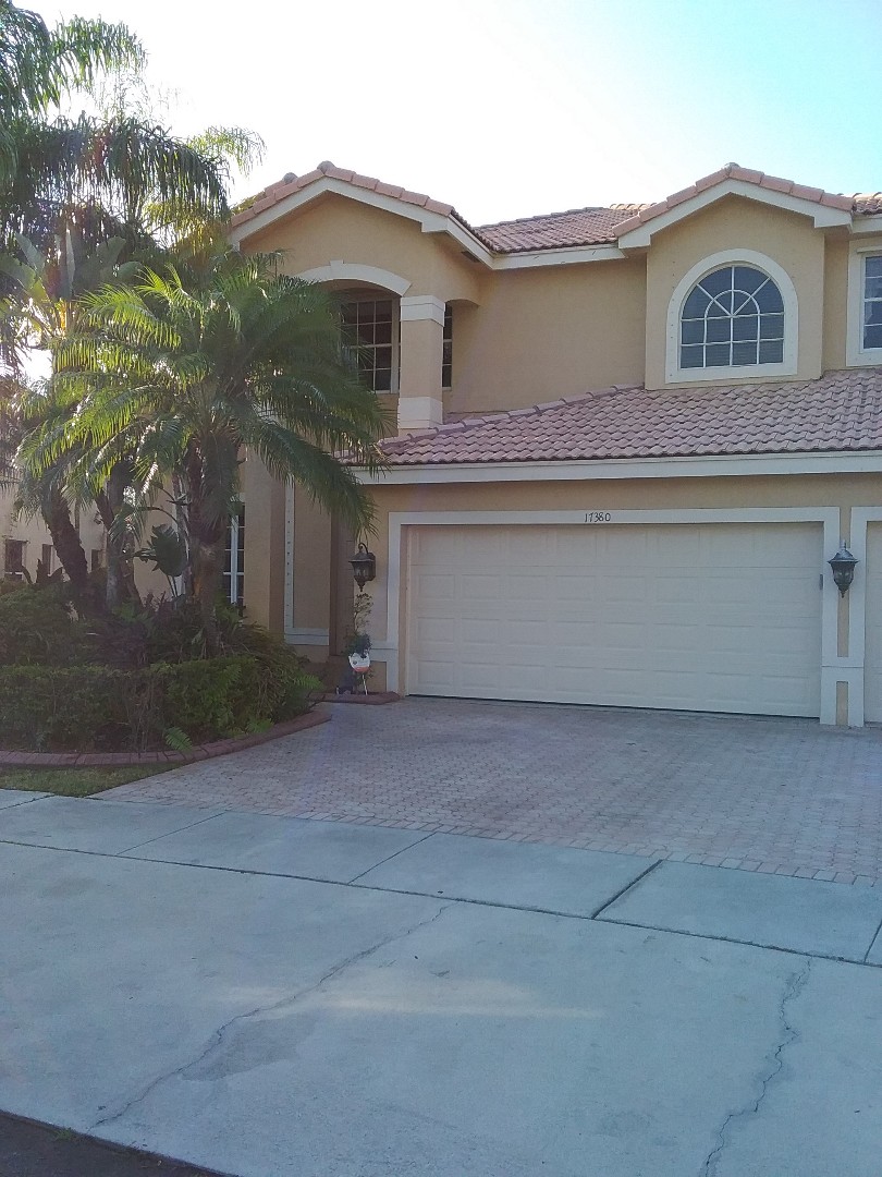 Roof tile repair in the city of Miramar Florida this repair is being done by Earl W Johnston roofing company Tony and Darnell are you repair technicians Roof tile repair in the city of Miramar Florida this repair is being done by Earl W Johnston roofing company Tony and Darnell are you repair technicians