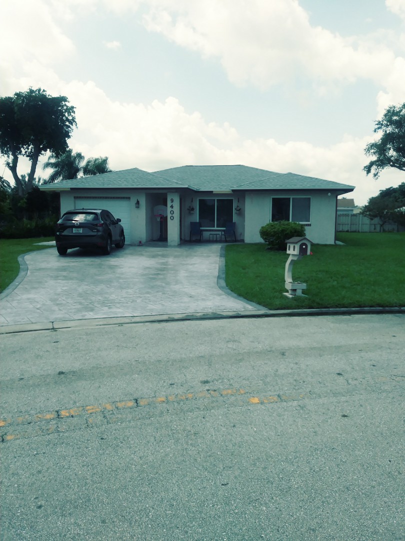 Tamarac, FL - Finished Gaf timberline shingle and flat roof by earl w Johnston roofing llc Tamarac, FL - Finished Gaf timberline shingle and flat roof by earl w Johnston roofing llc