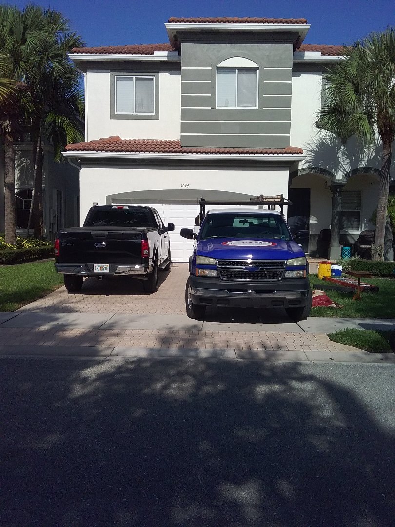 Boynton Beach, FL - Roof tile repair in the City of Boynton Beach Florida this repair is being done by Earl W Johnston Roofing company Tony Israel Darnell and Eli are you repair technicians Boynton Beach, FL - Roof tile repair in the City of Boynton Beach Florida this repair is being done by Earl W Johnston Roofing company Tony Israel Darnell and Eli are you repair technicians