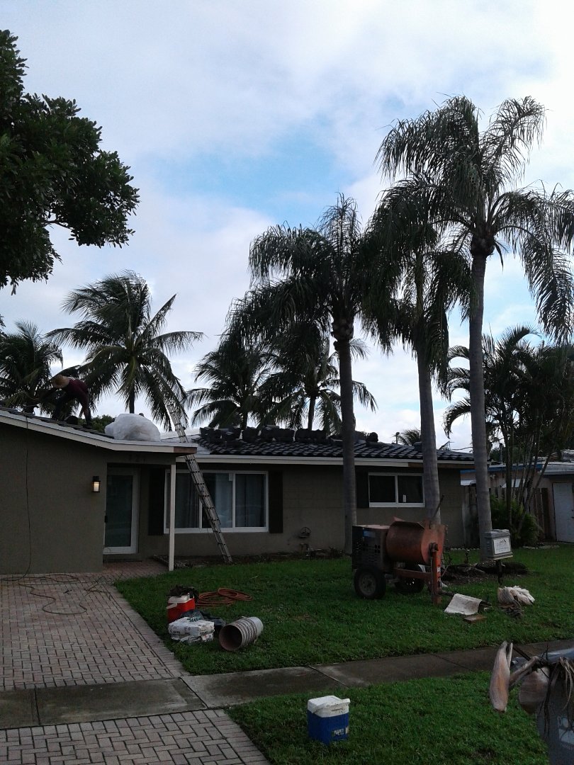 Pompano Beach, FL - Installing pitch pans in Pompano Beach by Duane and Israel from Earl W Johnston Roofing Pompano Beach, FL - Installing pitch pans in Pompano Beach by Duane and Israel from Earl W Johnston Roofing
