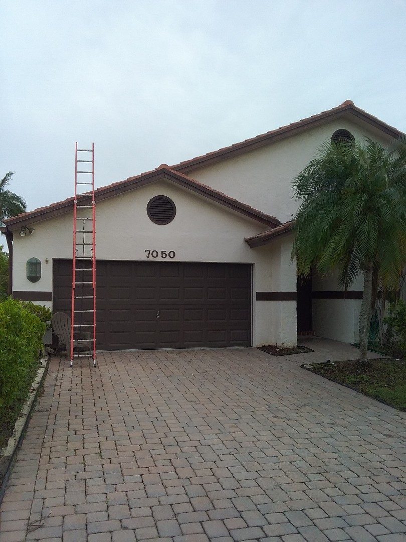 Tamarac, FL - Tile roof repair in the city of Tamarac Florida this repairs being done by Earl W Johnston roofing company Tony and Darnell are you repair technicians Tamarac, FL - Tile roof repair in the city of Tamarac Florida this repairs being done by Earl W Johnston roofing company Tony and Darnell are you repair technicians