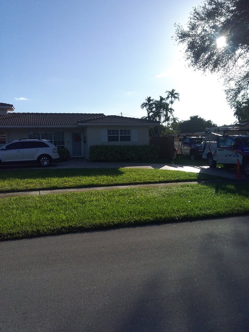 Dania Beach, FL - Flat deck roof repair in the city of Hollywood Florida this repair is being done by Earl W Johnston roofing company Tony Dwayne and Israel are you repair technicians Dania Beach, FL - Flat deck roof repair in the city of Hollywood Florida this repair is being done by Earl W Johnston roofing company Tony Dwayne and Israel are you repair technicians