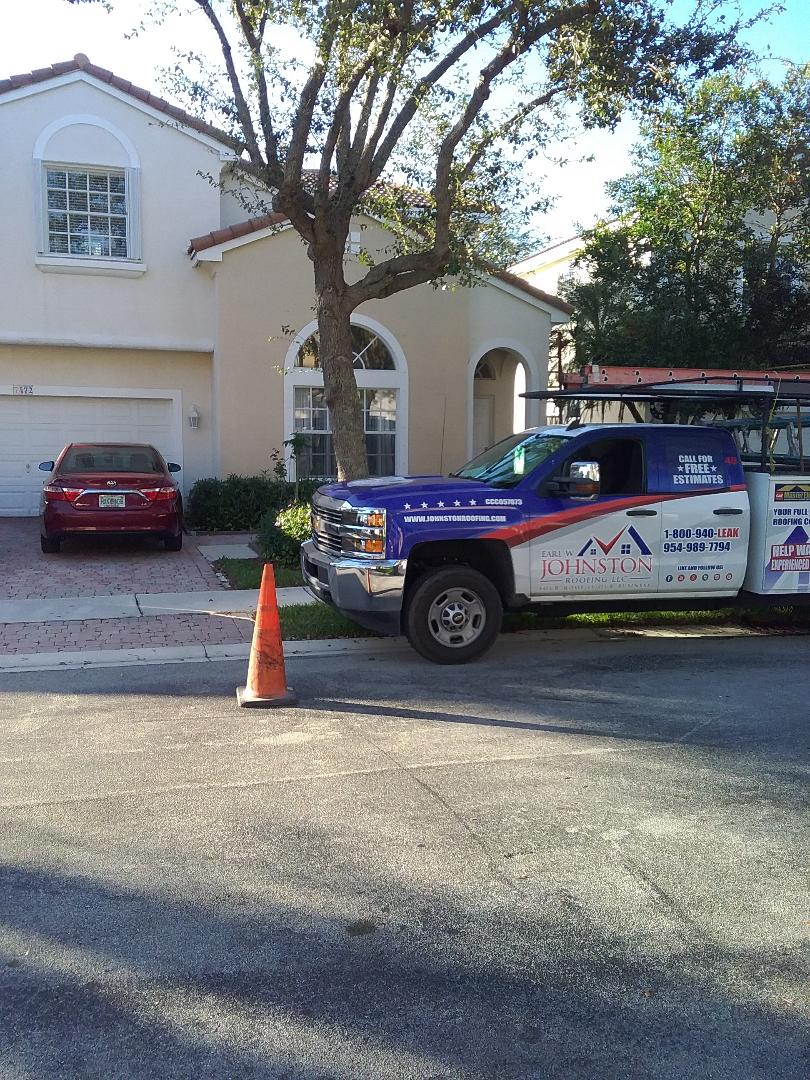 Roof tile repair in the city of Pembroke Pines Florida this repair is being done by Earl W Johnston roofing company Tony and Darnell are you repair technicians Roof tile repair in the city of Pembroke Pines Florida this repair is being done by Earl W Johnston roofing company Tony and Darnell are you repair technicians