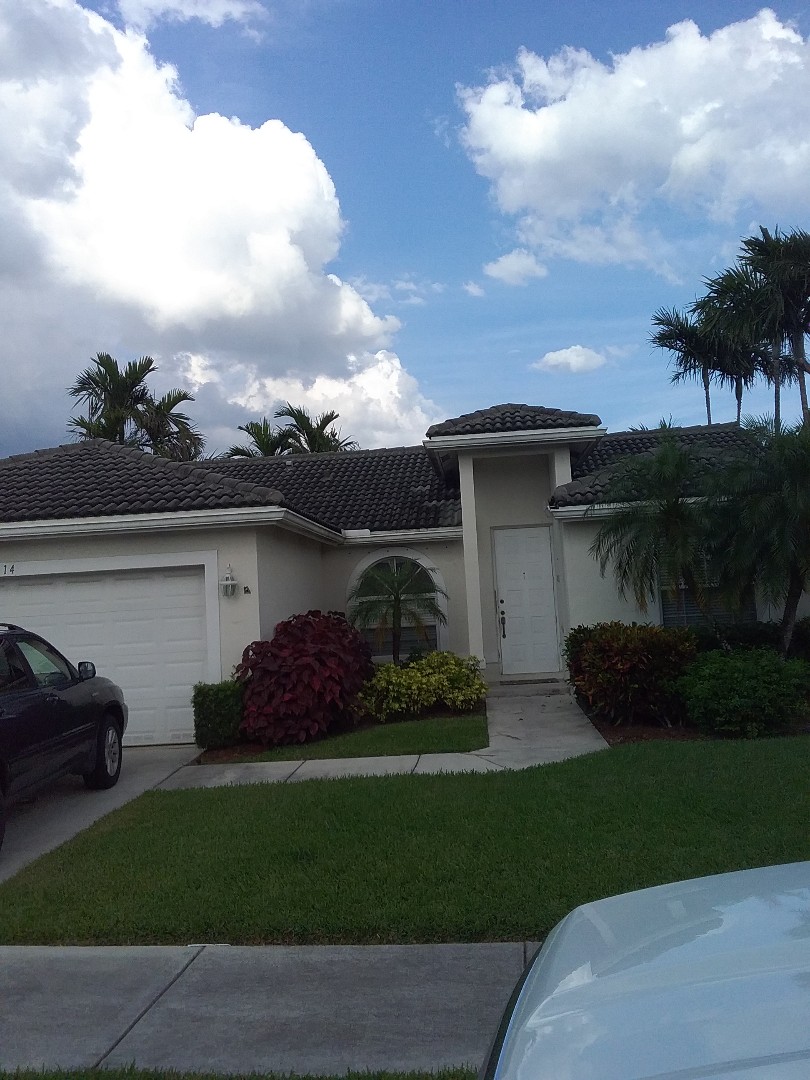 Oakland Park, FL - Repair tiles roof by Alexis and Israel front early w Johnson roofing Oakland Park, FL - Repair tiles roof by Alexis and Israel front early w Johnson roofing