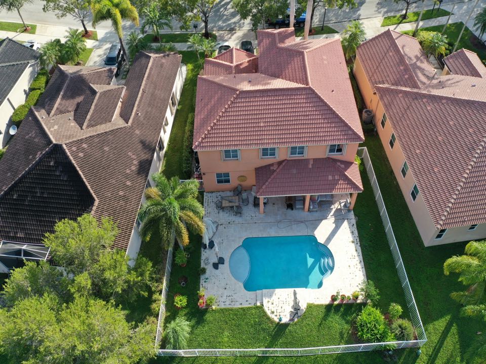Tile roof replacement estimate in Weston, FL by Mike Wilde and Earl Johnston Roofing Tile roof replacement estimate in Weston, FL by Mike Wilde and Earl Johnston Roofing