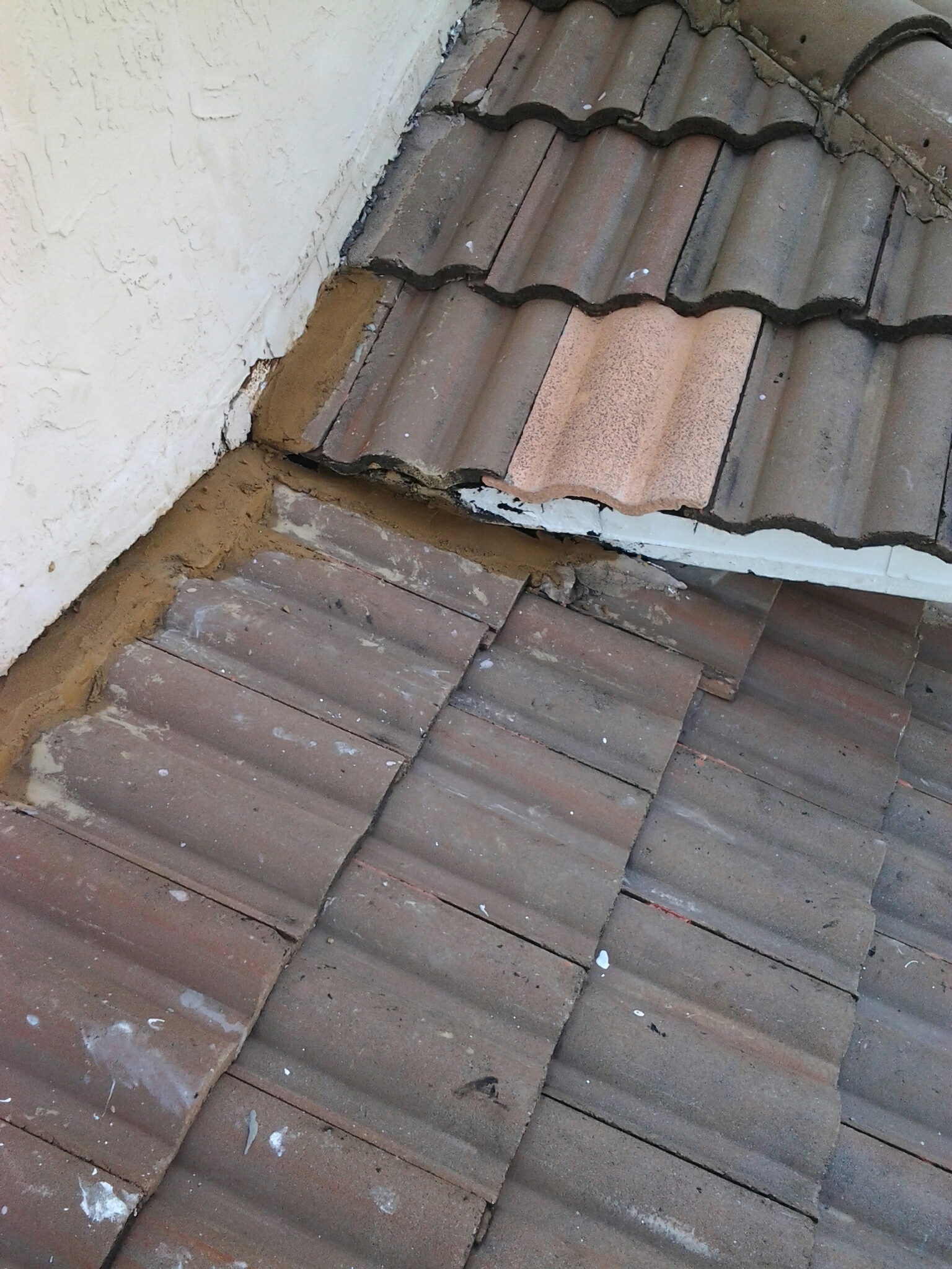 Cutler Bay, FL - Roof Tile repair in the cityof Cutler Bay Earl W Johnston roofing company repair technicians are Tony and Jose this is a finsh repair Cutler Bay, FL - Roof Tile repair in the cityof Cutler Bay Earl W Johnston roofing company repair technicians are Tony and Jose this is a finsh repair