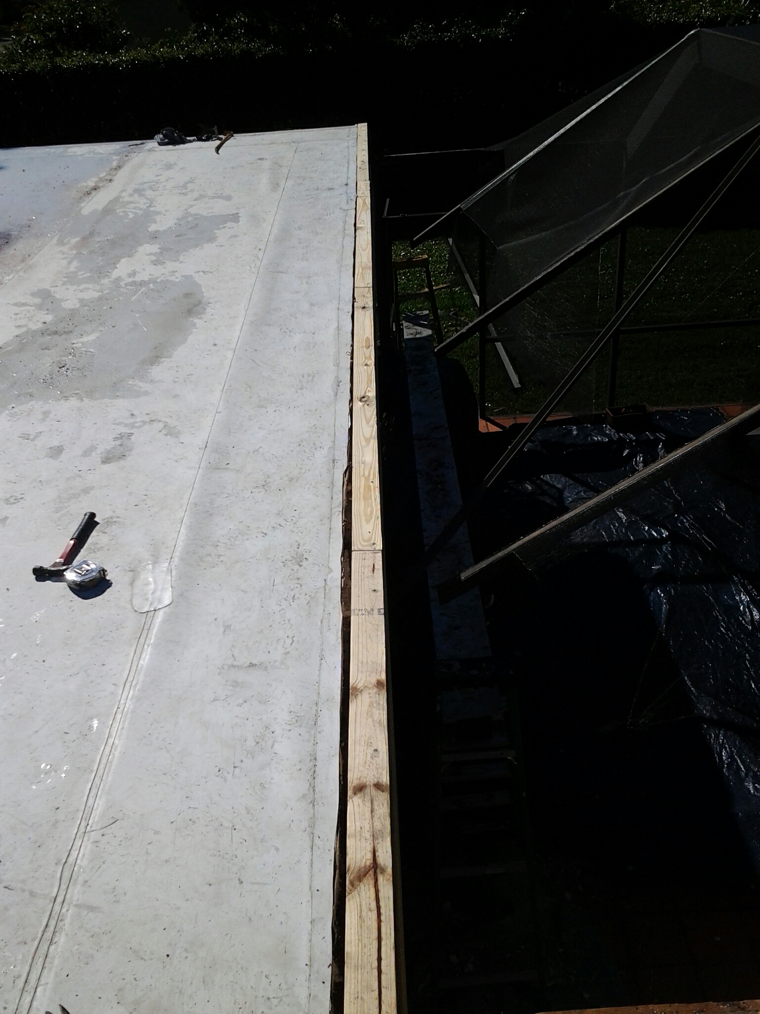 Palmetto Bay, FL - Mike and Earl Johnston roofing installing new tpo edge wit new nailer and new 4?4evedrip. Palmetto Bay, FL - Mike and Earl Johnston roofing installing new tpo edge wit new nailer and new 4?4evedrip.