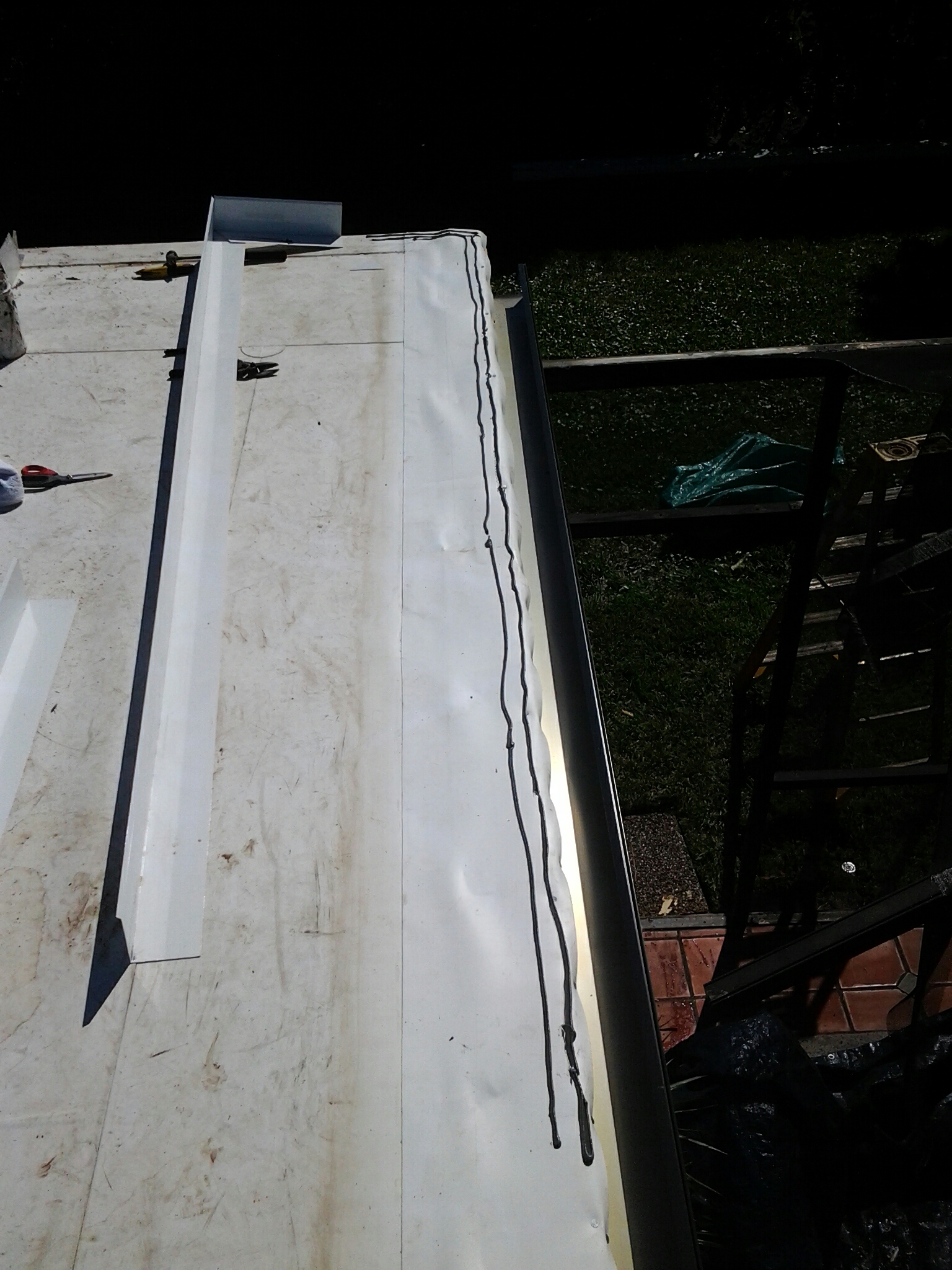 Palmetto Bay, FL - Mike and Earl Johnston roofing doing installing new 4?4evedrip on tpo roof. Palmetto Bay, FL - Mike and Earl Johnston roofing doing installing new 4?4evedrip on tpo roof.