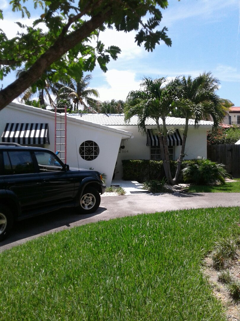 Key Biscayne, FL - Tile roof repair in the city of Key Biscayne Florida this repair is being done by Earl W Johnston roofing company Tony and Adam are you repair technicians Key Biscayne, FL - Tile roof repair in the city of Key Biscayne Florida this repair is being done by Earl W Johnston roofing company Tony and Adam are you repair technicians