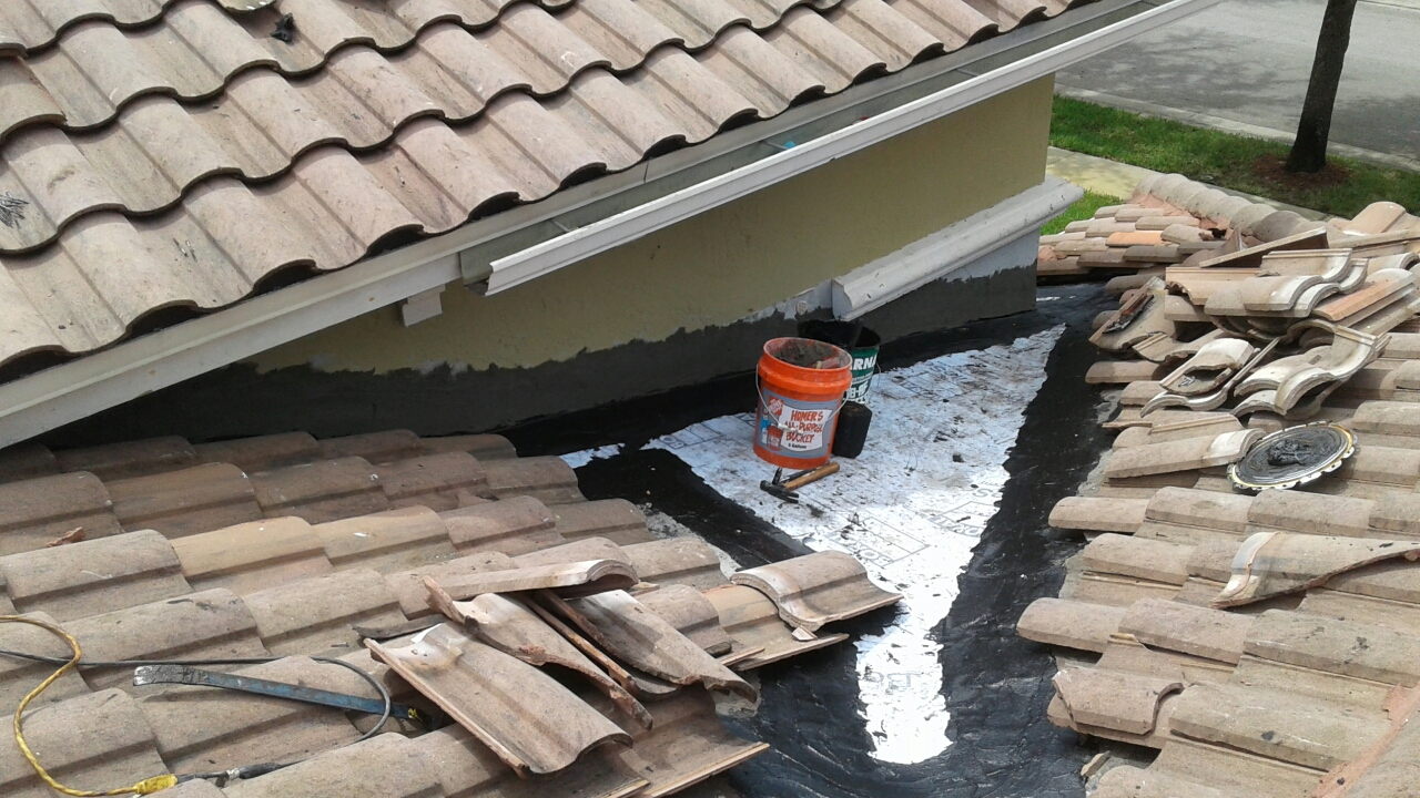 Mike and Earl Johnston roofing instilling tile Mike and Earl Johnston roofing instilling tile