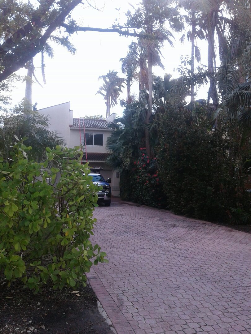 Golden Beach, FL - Roof tile repair in the city of golden Beach Florida this is being done by Earl W Johnston roofing company Tony Chris Jose and Dwayne are you repair technician Golden Beach, FL - Roof tile repair in the city of golden Beach Florida this is being done by Earl W Johnston roofing company Tony Chris Jose and Dwayne are you repair technician