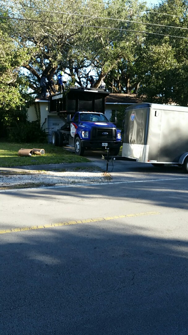 North Miami, FL - Tearing off of shingle roof in North Miami replacing with a shingle roof North Miami, FL - Tearing off of shingle roof in North Miami replacing with a shingle roof