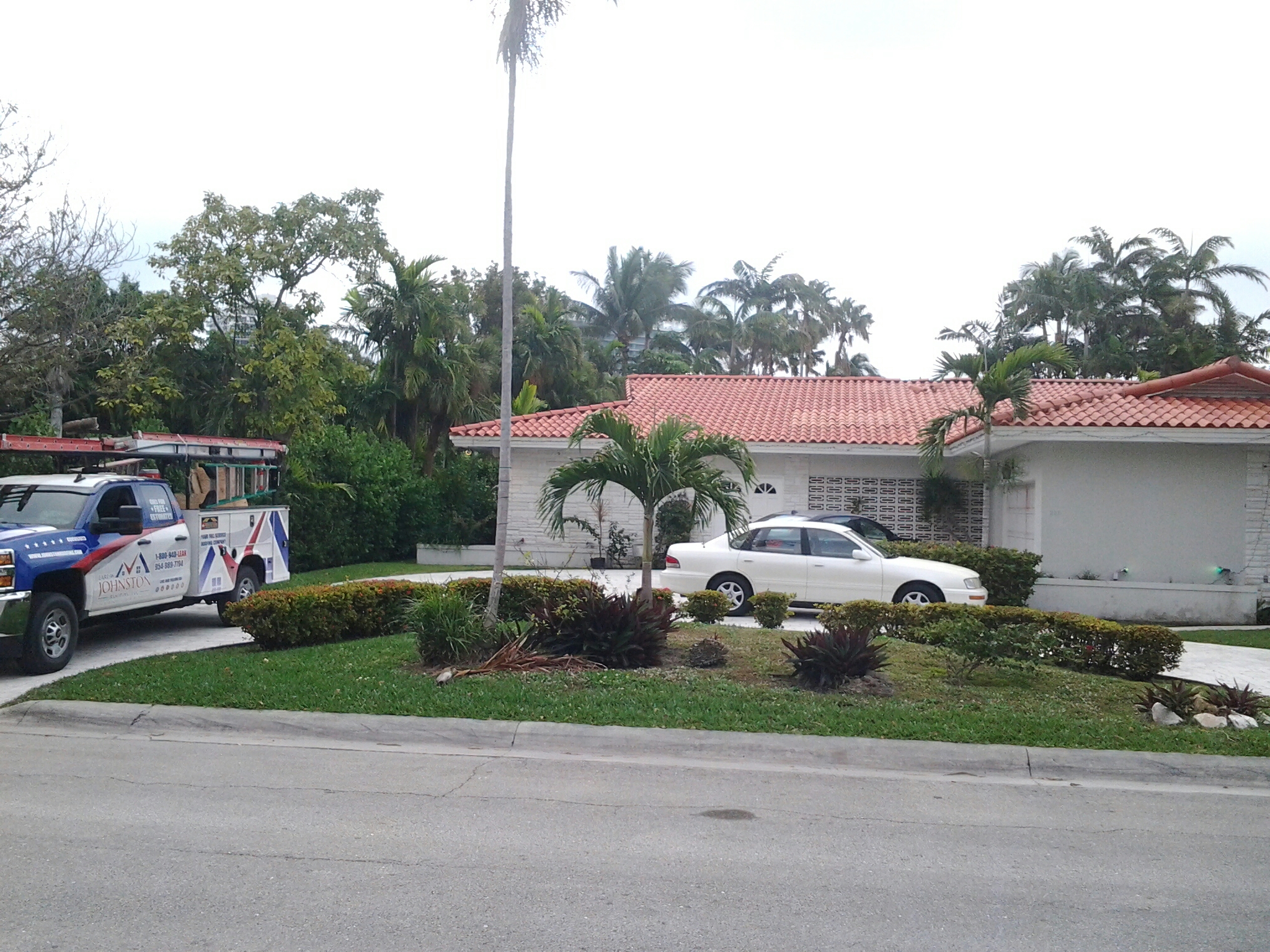 Bal Harbour, FL - Tile roof repair in the city of Bal Harbour fl this repair is being done by Earl w Johnston roofing company Jos? end Duane are you repair technicians Bal Harbour, FL - Tile roof repair in the city of Bal Harbour fl this repair is being done by Earl w Johnston roofing company Jos? end Duane are you repair technicians