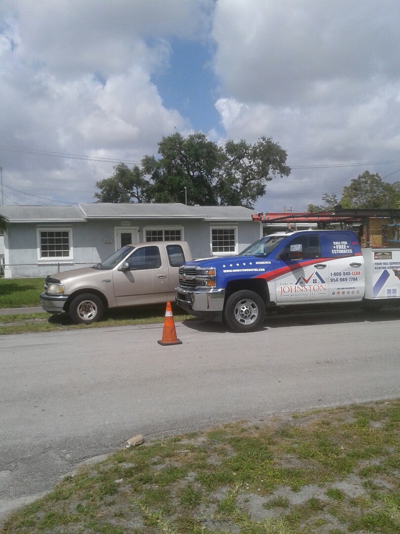 Miami Gardens, FL - shingle repair in the city of Miami Gardens this repair is being done Earl W Johnston roofing company Tony and Tavares are your repair technicians Miami Gardens, FL - shingle repair in the city of Miami Gardens this repair is being done Earl W Johnston roofing company Tony and Tavares are your repair technicians