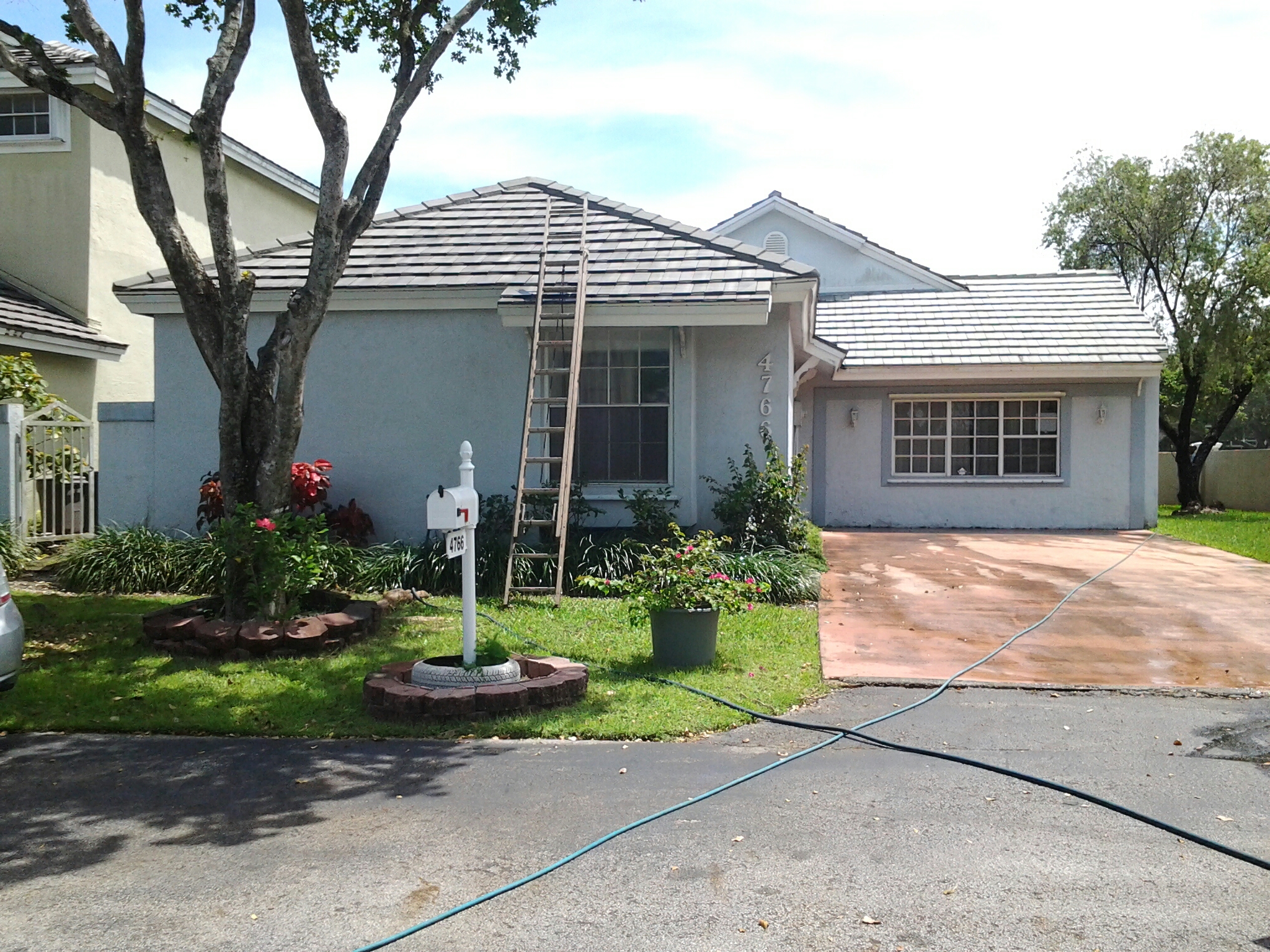 Doral, FL - Brandon and Gary Applying Roof A Cide Doral, FL - Brandon and Gary Applying Roof A Cide