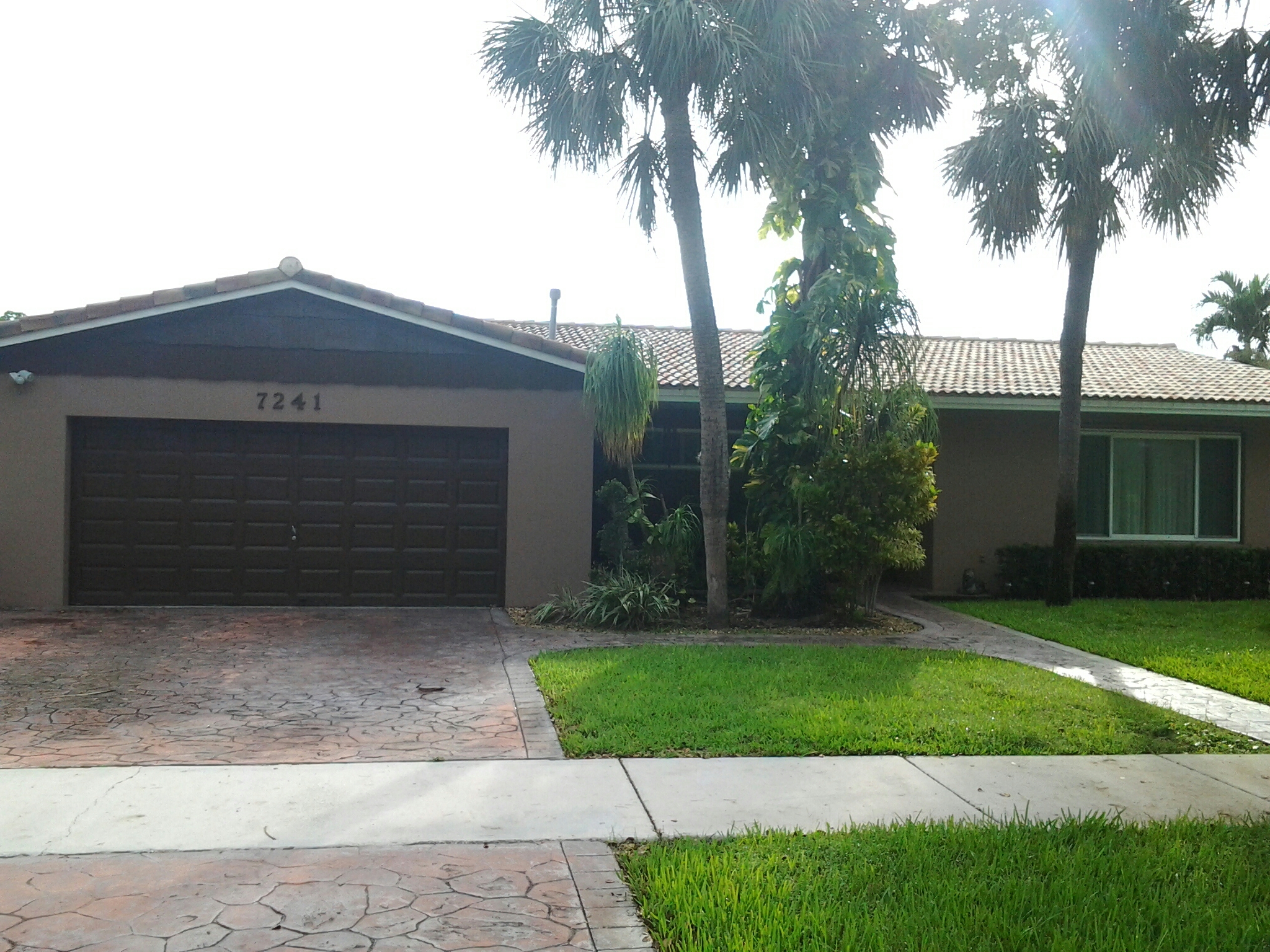Miami Lakes, FL - Brandon and Gary Applying roof a cide Miami Lakes, FL - Brandon and Gary Applying roof a cide