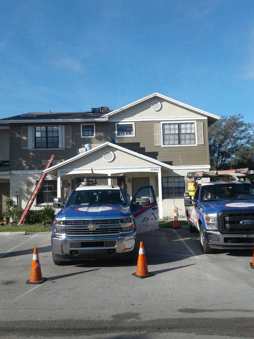 Building 15 re-roofing being done by Earl W Johnston roofing company in the city of Pembroke Pines Florida Building 15 re-roofing being done by Earl W Johnston roofing company in the city of Pembroke Pines Florida