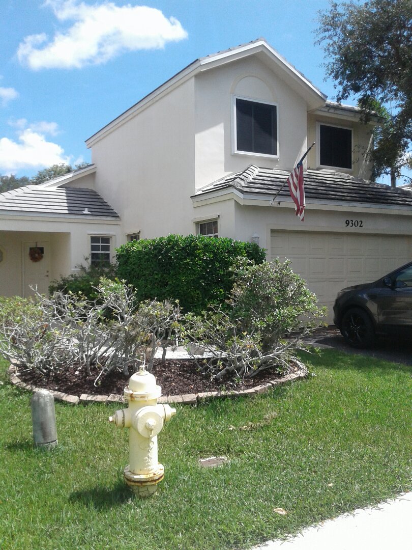 Roof tile repair in the city of Davie Florida this repair is being done by Earl W Johnston roofing company Tony and Regis are your repair technician Roof tile repair in the city of Davie Florida this repair is being done by Earl W Johnston roofing company Tony and Regis are your repair technician
