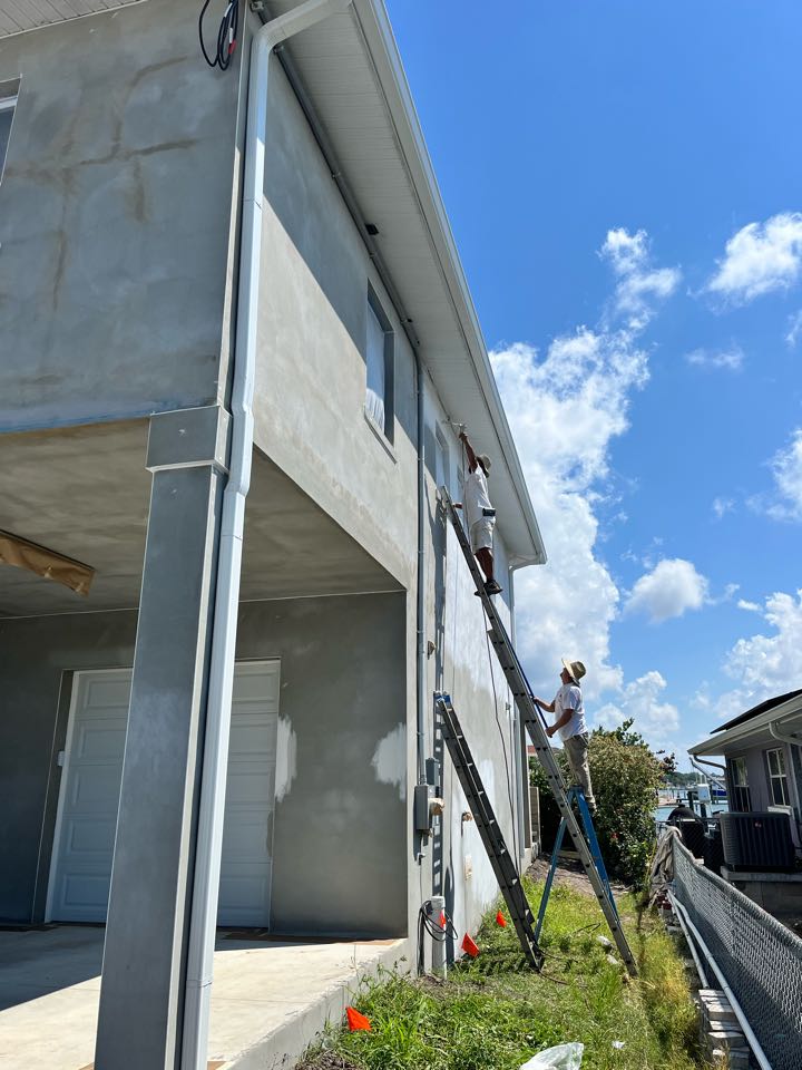 Hot Stucco primer for all new stucco on this full exterior repaint with Premier Painting And Coating call for your free estimate (727)440-9393 Interior exterior residential or commercial