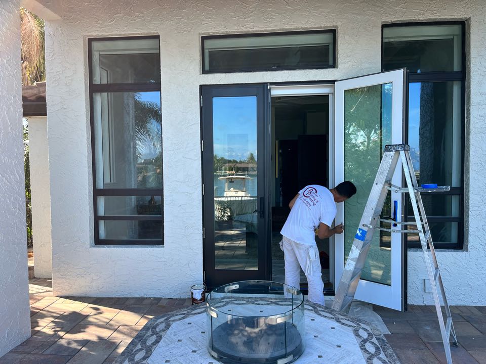 Putting the finishing touches on these new doors with Premier Painting And Coating call for your free estimate (727)440-9393 interior exterior residential or commercial