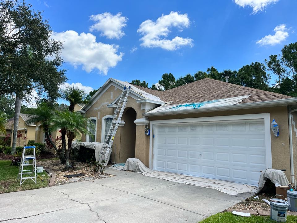 All prepped out working on soffits, facia gutters, and other white accents before we spray out the body on this full exterior repaint with Premier Painting and Coating call for your free estimate (727)440-9393 stucco repairs, drywall, repairs, interior, exterior residential commercial, and cabinetry painting