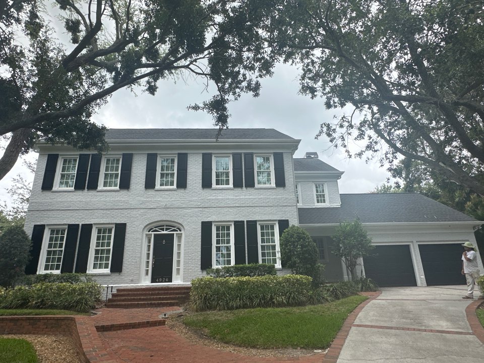 A couple short days ago this beautiful Tampa home was all red brick, now it looks clean, fresh and modern white brick with black accents. Another awesome job by Alber and his crew.