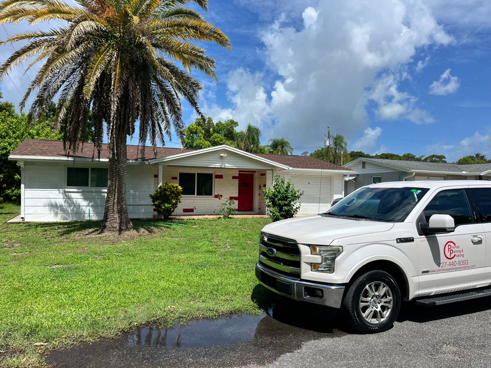 All washed now time for prep on this exterior repaint with Premier Painting and Coating call for your free estimate (727)440-9393 all repairs, stucco repairs, interior, exterior residential commercial, and cabinetry painting
