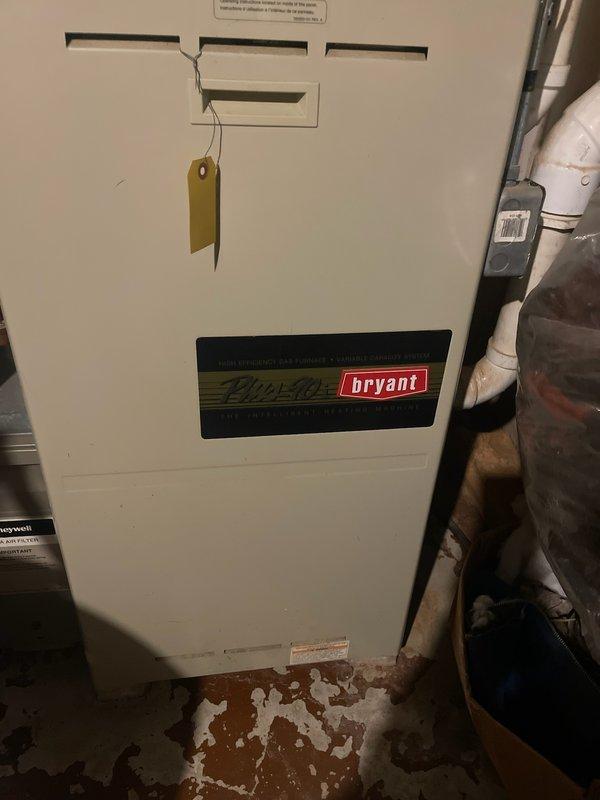 Responded to no heat complaint at residence with 29-year-old Bryant Plus 90 furnace. Diagnostic inspection revealed failed heat exchanger, which presents safety hazard. Provided customer with replacement options for new furnace system. Current unit located in basement utility area with existing ductwork that will accommodate replacement system.