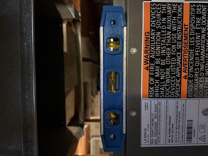 Completed full system installation including EL297V 90k furnace, EL15KC1 3-ton condenser, cased coil (3-ton C frame), and new media cabinet. Installed 18ft of 3" PVC venting, replaced rusted 14x10 duct on front of plenum, relocated 6" run from top of plenum, and cut back leaking 3" PVC exhaust. Verified proper leveling of equipment during installation.