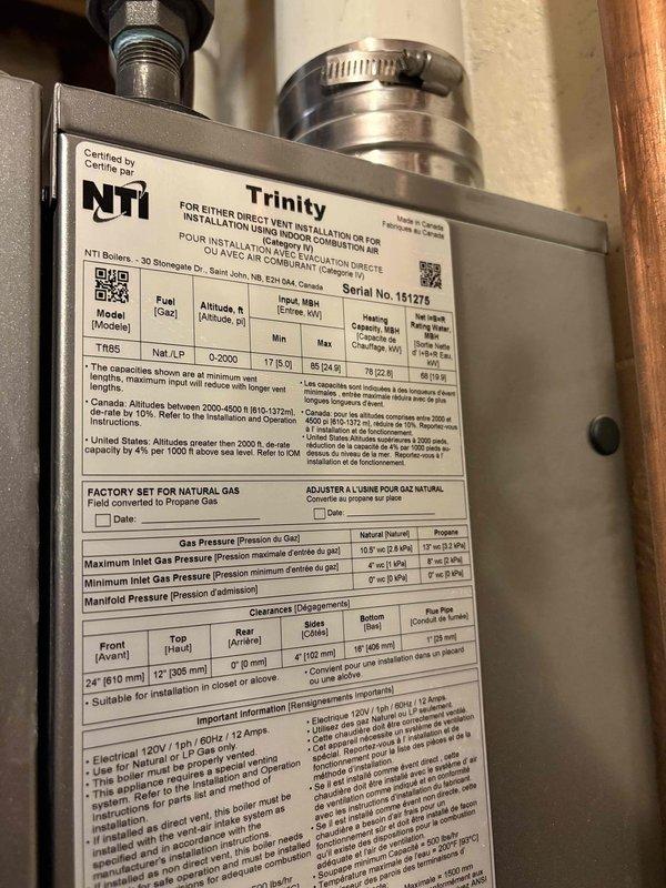 Replaced failed PRO thermostat with new PRO T701 model for boiler system located in customer's bunker area. During service, observed dirty flame sensor and ignitor on NTi Trinity TR85 boiler and performed cleaning to improve operation. Recommended scheduling a complete boiler tune-up to address additional performance issues identified during service.