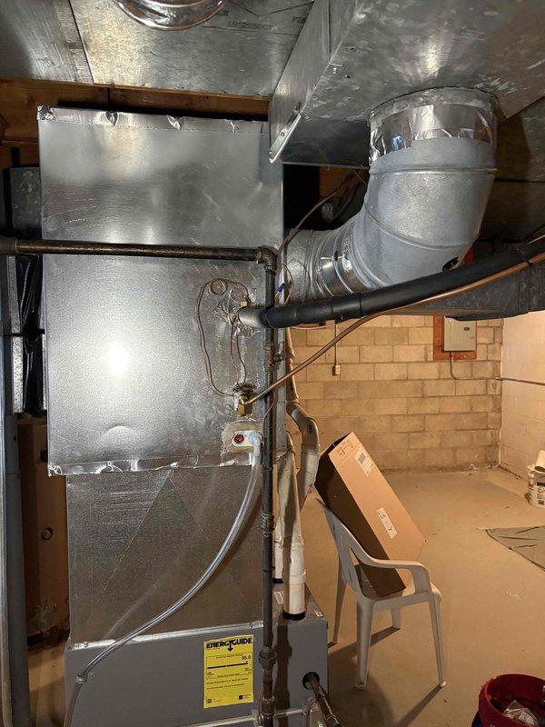 Responded to no-heat call for older Armstrong system. Discovered walnuts inside inducer motor causing obstruction. Removed motor, cleared debris, reinstalled component, and verified proper system operation. Heat function restored successfully.