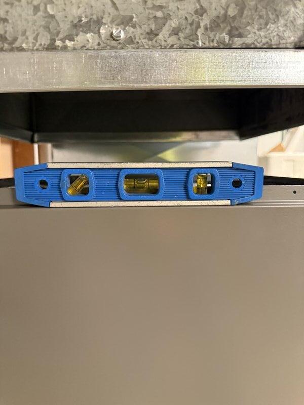 Completed installation of Lennox EL297V 70K BTU furnace sourced from stock inventory. Verified proper leveling of the unit during installation and connected control board wiring according to manufacturer specifications. All system connections were properly terminated at the circuit board terminal block with appropriate wire routing.