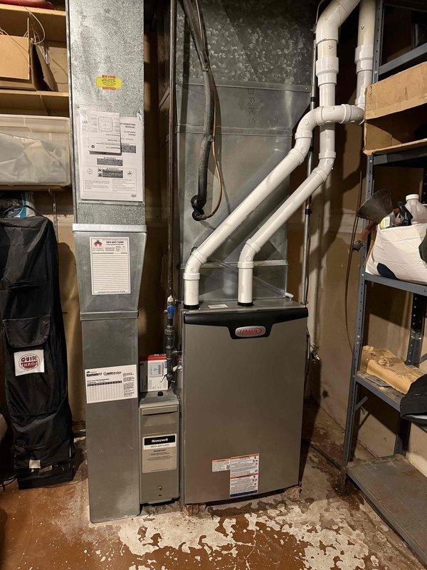 Successfully installed a new Lennox EL297E 90K BTU furnace to resolve no-heat condition. System includes properly configured PVC exhaust venting and all necessary ductwork connections. Complete installation verified with operational testing to ensure proper functionality.