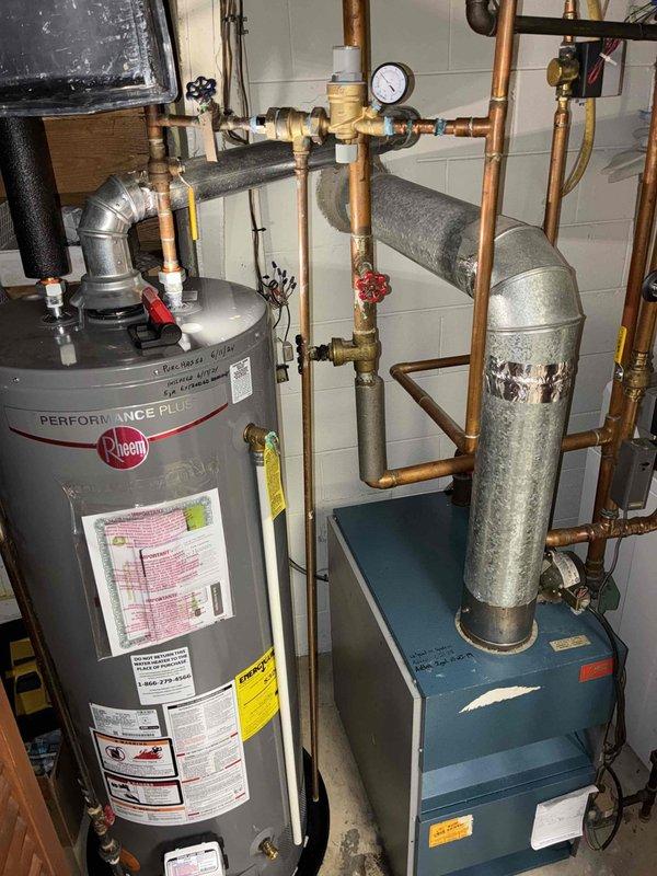 Responded to a callback regarding persistent leakage from boiler system after previous service. Inspection revealed shredded gasket inside backflow preventer/pressure reducing valve combo unit. Replaced damaged gasket, resealed system, and restored proper pressure. System successfully tested through two complete heating cycles with no active leaks detected.