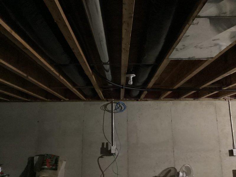 Successfully installed a Kohler 20RCA 20kW air-cooled home standby generator with aluminum cabinet and 200A service-rated automatic transfer switch adjacent to basement electrical panel. System was properly grounded and includes battery, carburetor heater, and oil heater components, with all necessary low/line voltage wiring and gas connections completed per specifications.