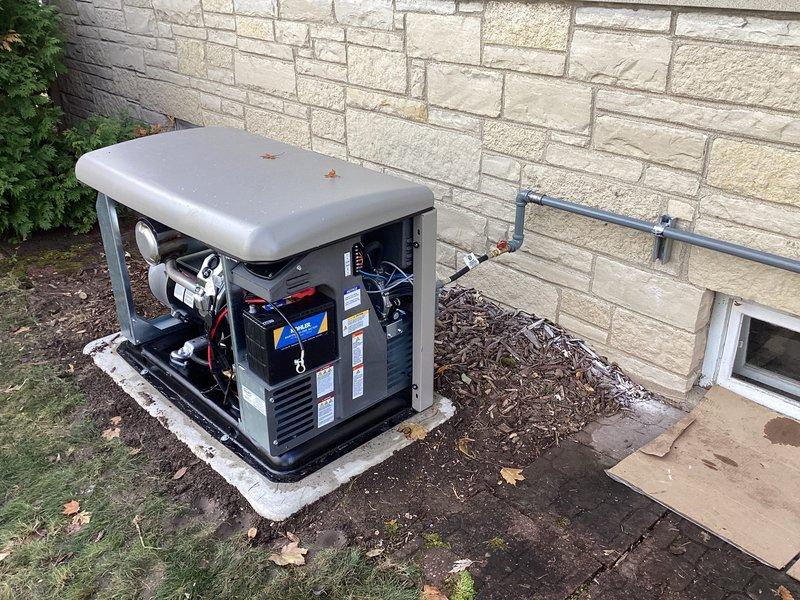 Successfully installed a 20KW Kohler air-cooled home standby generator with aluminum cabinet on a concrete pad alongside customer's residence. Installed 100A service-rated Automatic Transfer Switch adjacent to the electrical panel in the basement, including all necessary low and line voltage wiring. Completed proper grounding and bonding, and installed all required gas piping with exterior lines painted gray using oil-based paint as specified.