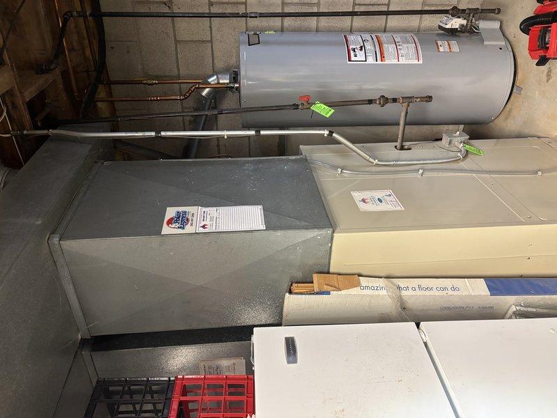 Performed fall maintenance service on customer's furnace under CCC Quality Plan. Unit is significantly aged (30+ years) with standard ductwork and connections observed in basement utility area. Recommended replacement quote due to furnace age and potential efficiency/reliability concerns.