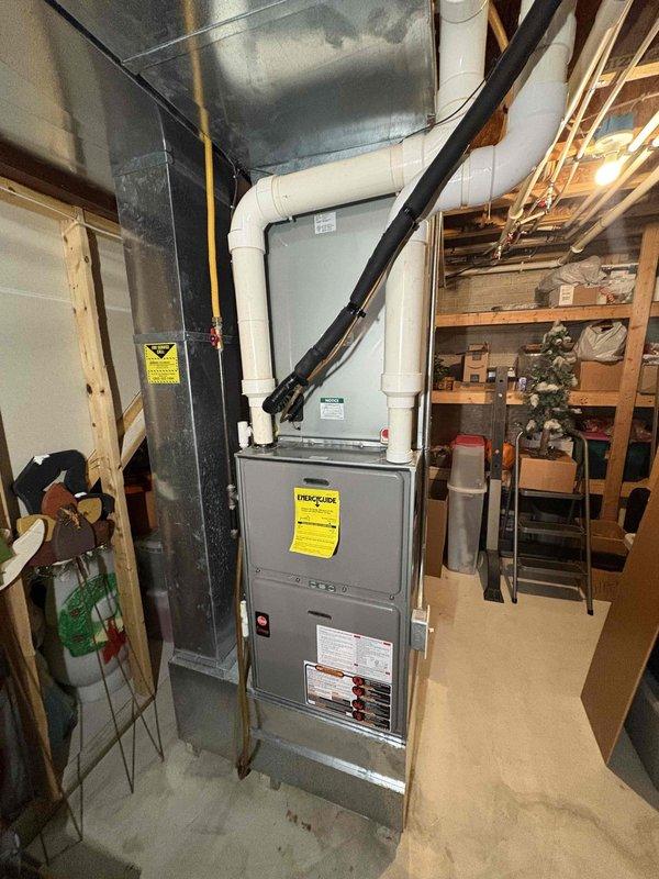 Dousman, WI - Diagnosed non-functioning older gas furnace with running blower but no heat production. Found failed igniter preventing combustion. Replaced igniter, verified proper ignition sequence and heat output restored to furnace located in basement utility area. Dousman, WI - Diagnosed non-functioning older gas furnace with running blower but no heat production. Found failed igniter preventing combustion. Replaced igniter, verified proper ignition sequence and heat output restored to furnace located in basement utility area.