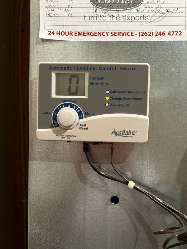 Responded to service call for Aprilaire humidifier with illuminated service light and slow operation. Diagnostic inspection revealed water panel required replacement. Successfully installed new water panel, resolving the service issue.
