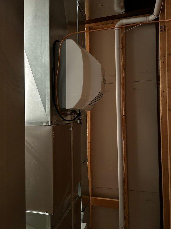 Responded to service call for Aprilaire humidifier with illuminated service light and slow operation. Diagnostic inspection revealed water panel required replacement. Successfully installed new water panel, resolving the service issue.