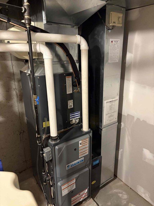 Completed annual maintenance service on Daikin furnace system per CCC Quality Plan agreement. Replaced failed inducer motor under parts warranty and installed new 16x25x5 filter. Addressed drainage issues by installing new drain hose. System includes Carrier AirCare humidifier. Recommended follow-up inspection of inducer boot and tubing to check for additional debris.