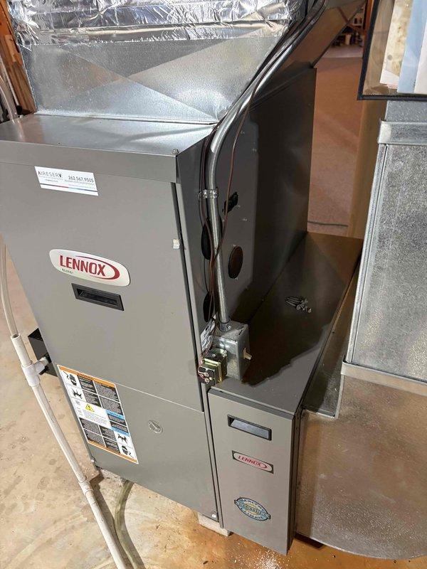 Diagnosed Lennox furnace system with no heat complaint. Confirmed unit was blowing cold air due to failed inducer motor. Provided temporary space heaters and recommended furnace replacement as the best solution.